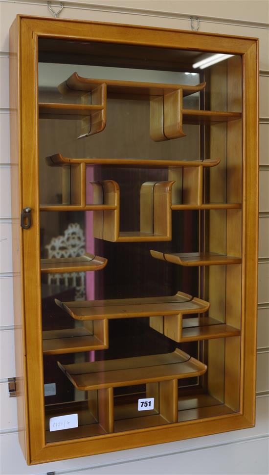 A Chinese hanging mirrored display cabinet W.46cm